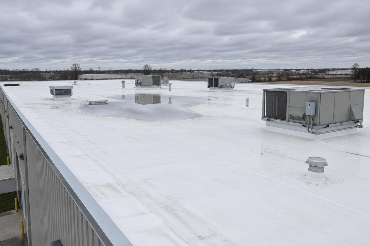 White TPO membrane roof with rooftop units